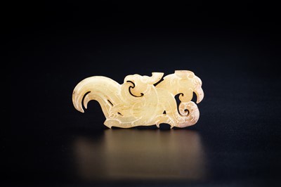 Lot 130 - A PALE GREEN JADE CARVING WITH DRAGON AND PHOENIX, BEISHANTOU TYPE, WESTERN HAN
