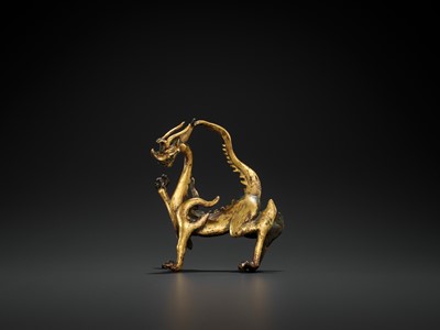 Lot 428 - A RARE GILT BRONZE FIGURE OF A DRAGON, TANG DYNASTY