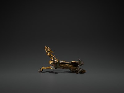 Lot 428 - A RARE GILT BRONZE FIGURE OF A DRAGON, TANG DYNASTY