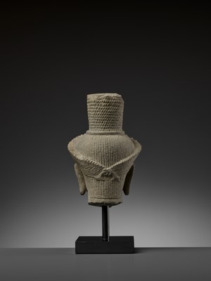 Lot 705 - AN IMPORTANT SANDSTONE HEAD OF SHIVA, ANGKOR WAT STYLE