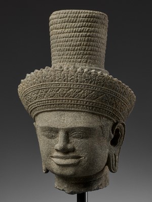 Lot 705 - AN IMPORTANT SANDSTONE HEAD OF SHIVA, ANGKOR WAT STYLE