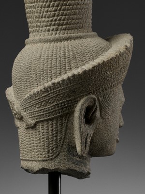 Lot 705 - AN IMPORTANT SANDSTONE HEAD OF SHIVA, ANGKOR WAT STYLE