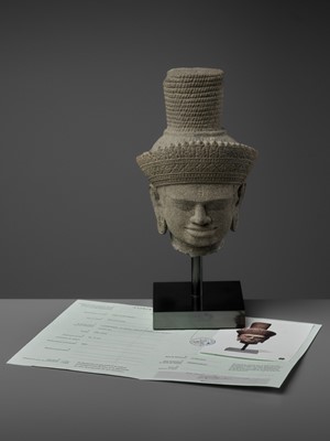 Lot 705 - AN IMPORTANT SANDSTONE HEAD OF SHIVA, ANGKOR WAT STYLE