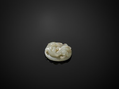Lot 100 - AN EXQUISITE SMALL PALE CELADON JADE SWORD POMMEL WITH HORNLESS DRAGON, WESTERN HAN