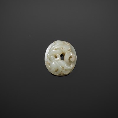 AN EXQUISITE SMALL PALE CELADON JADE SWORD POMMEL WITH HORNLESS DRAGON, WESTERN HAN