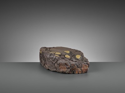 Lot 196 - A MASSIVE CARVED ‘MELON’ DUAN INKSTONE, EARLY QING