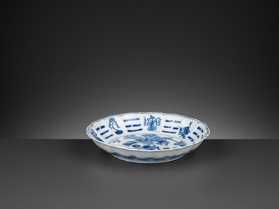 Lot 226 - A BLUE AND WHITE ‘BAGUA’ LOBED DISH, KANGXI PERIOD