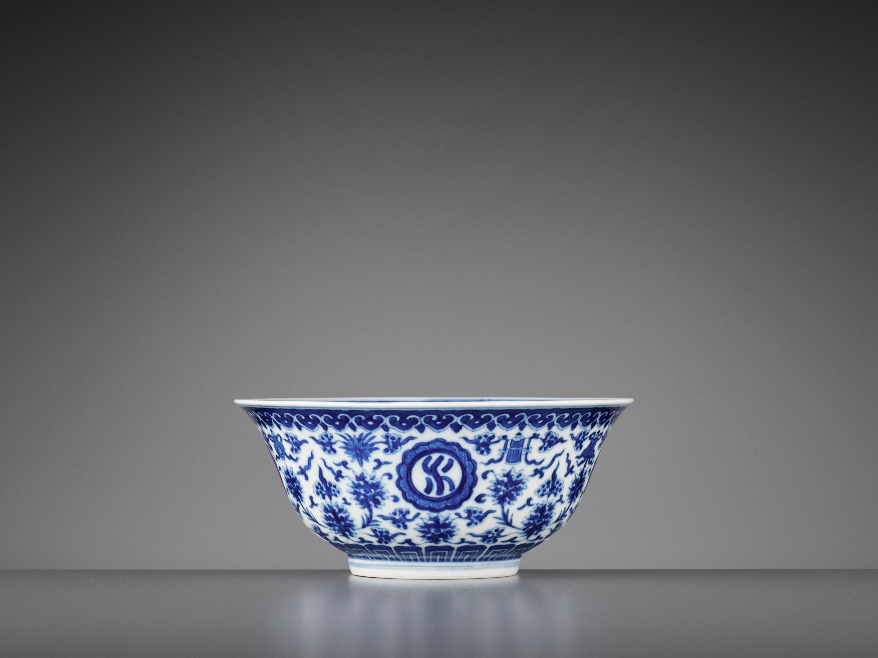 Lot 258 - A BLUE AND WHITE 'FLORAL' BOWL, DAOGUANG