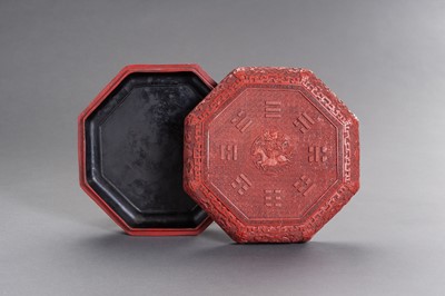 Lot 956 - A MOLDED CINNABAR LACQUER BOX AND COVER