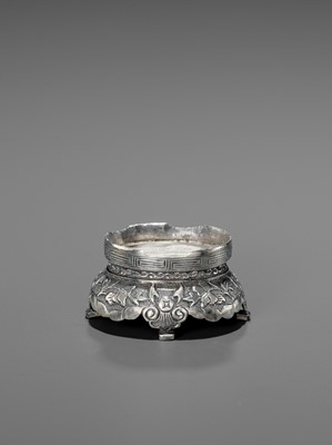 Lot 409 - A SMALL ‘ZUYIN’ PURE SILVER REPOUSSE BASE, QING DYNASTY
