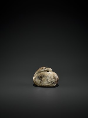 Lot 82 - A ‘CHICKEN BONE’ AND BLACK JADE ‘GOOSE’ PENDANT, MING DYNASTY