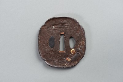 Lot 681 - AN INLAID IRON TSUBA WITH A MAN TRYING TO CATCH A FOX