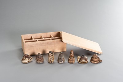 Lot 186 - A SET OF SEVEN LUCKY GODS IN WOODEN BOX