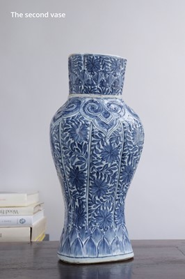 Lot 230 - A PAIR OF MOLDED ‘FLORAL’ WALL VASES, KANGXI