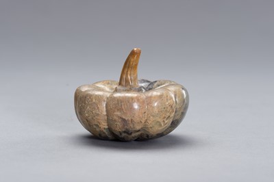 Lot 526 - A CARVED STONE DEPICTING A PUMPKIN