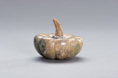 Lot 526 - A CARVED STONE DEPICTING A PUMPKIN