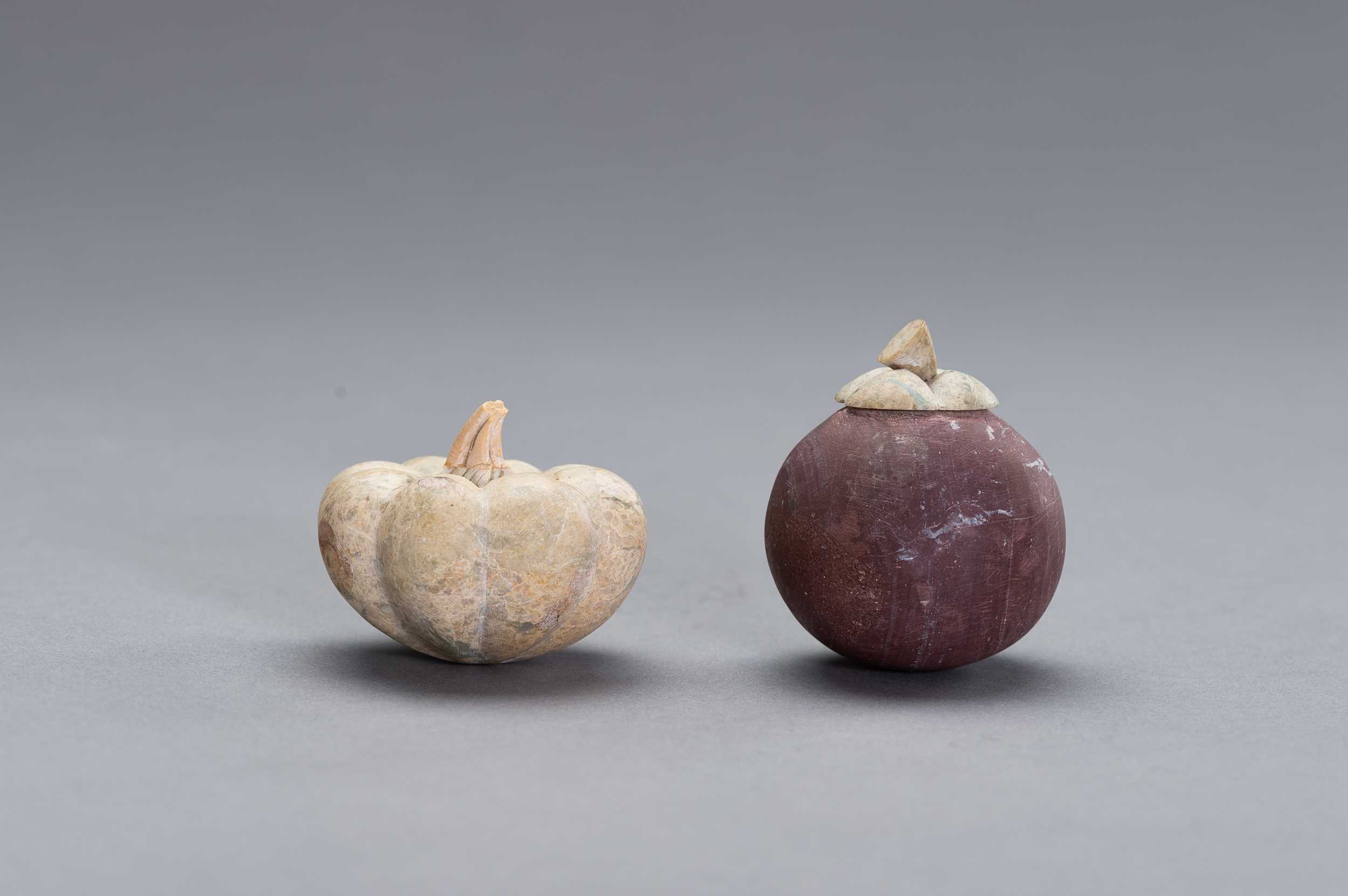 Lot 525 - TWO STONE CARVINGS OF FRUITS