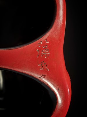 Lot 283 - SOMIN: A SUPERB TSUISHU (CARVED RED LACQUER) MASK NETSUKE OF A KARASU-TENGU