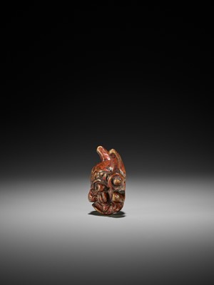 Lot 254 - AN UNUSUAL LACQUERED WOOD MASK NETSUKE OF AN ONI