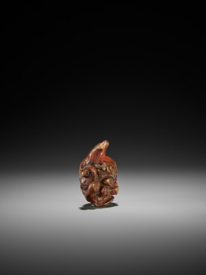 Lot 254 - AN UNUSUAL LACQUERED WOOD MASK NETSUKE OF AN ONI