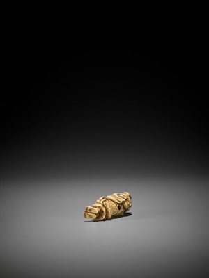 Lot 198 - TOMOTSUGU: AN IVORY NETSUKE OF A MOTHER WITH CHILD