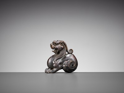 Lot 356 - A BRONZE ‘BIXIE’ WEIGHT, LATE MING TO EARLY QING