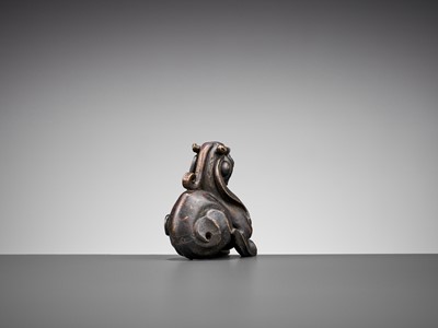 Lot 356 - A BRONZE ‘BIXIE’ WEIGHT, LATE MING TO EARLY QING