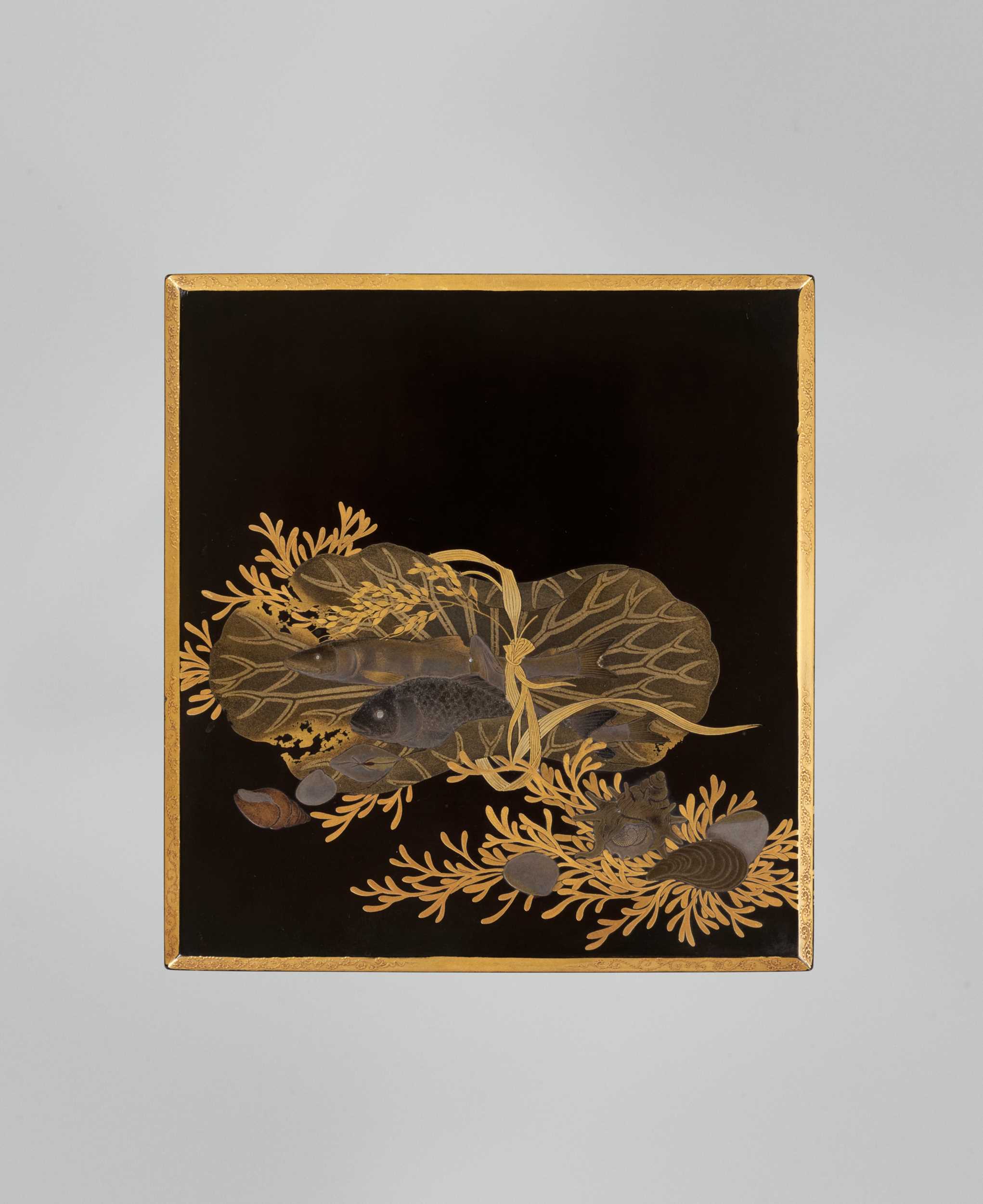 Lot 104 - A LACQUER SUZURIBAKO WITH FISH WRAPPED IN LOTUS LEAF