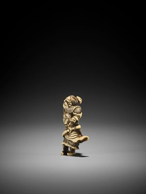 Lot 257 - A POWERFUL STAG ANTLER NETSUKE OF KAN’U, ATTRIBUTED TO TOMOHISA