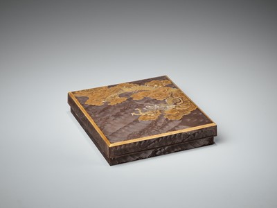 Lot 106 - A SUPERB ZESHIN-STYLE INLAID LACQUER SUZURIBAKO WITH DRAGON AMONGST CLOUDS AND COMBED WAVES
