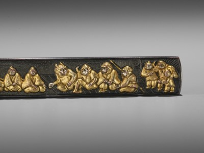 Lot 44 - A GOLD AND SILVER-INLAID GOTO SCHOOL SHAKUDO KOZUKA WITH RAIKO AND HIS MEN IN DISGUISE WITH SHUTEN DOJI AND ATTENDANT OGRES
