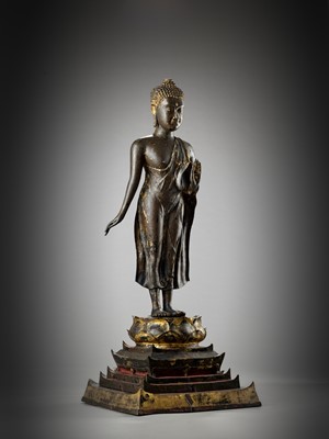 Lot 567 - A MONUMENTAL LACQUER-GILT BRONZE FIGURE OF BUDDHA, AYUTTHAYA KINGDOM