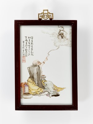Lot 294 - A PORCELAIN PLAQUE OF XIANGLONG (TAMING DRAGON) LUOHAN, BY WANG QI (1884-1937)