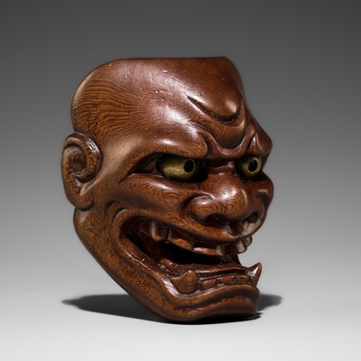 Lot 543 - DEME UMAN: A FINE WOOD MASK NETSUKE OF SHISHIGUCHI