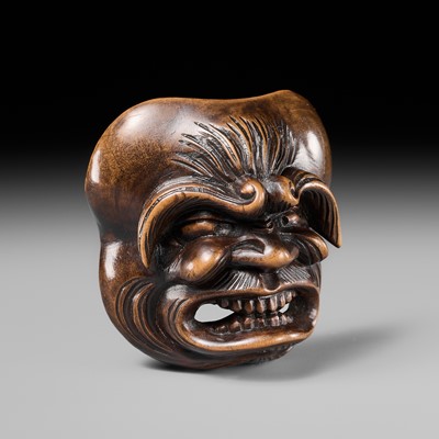 Lot 297 - AN UNUSUAL WOOD MASK NETSUKE OF A HAIRY MAN