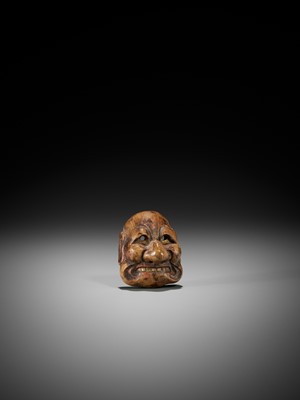 Lot 291 - KANO TESSAI: A LACQUERED WOOD MASK NETSUKE OF A KYOGEN MASK DEPICTING BUAKU