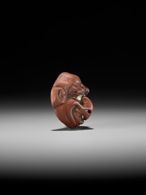 Lot 496 - SEKISEN: AN ONKO POTTERY MASK NETSUKE OF TOBI, KO-TENGU