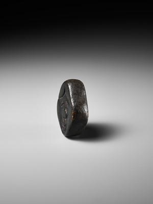 Lot 256 - AN UNUSUAL KIRI (PAULOWNIA) WOOD SHUNGA MASK NETSUKE OF FUKUWARAI TYPE