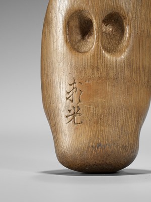 Lot 426 - YORIMITSU: A RARE AND UNUSUAL BAMBOO OMAI TYPE MASK NETSUKE
