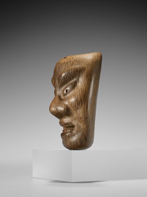 Lot 426 - YORIMITSU: A RARE AND UNUSUAL BAMBOO OMAI TYPE MASK NETSUKE