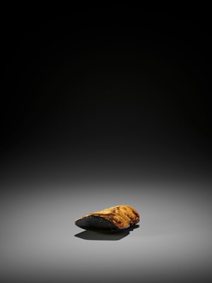 Lot 11 - AN IVORY FRAGMENT OF A CHINESE SAGE RE-PURPOSED AS A NETSUKE