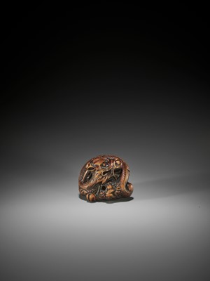 Lot 57 - A POWERFUL AND RARE WOOD NETSUKE OF A COILED DRAGON, ATTRIBUTED TO MITSUHARU