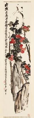 Lot 1072 - A HANGING SCROLL PAINTING OF A LYCHEE TREE IN THE STYLE OF WU CHANGSHUO