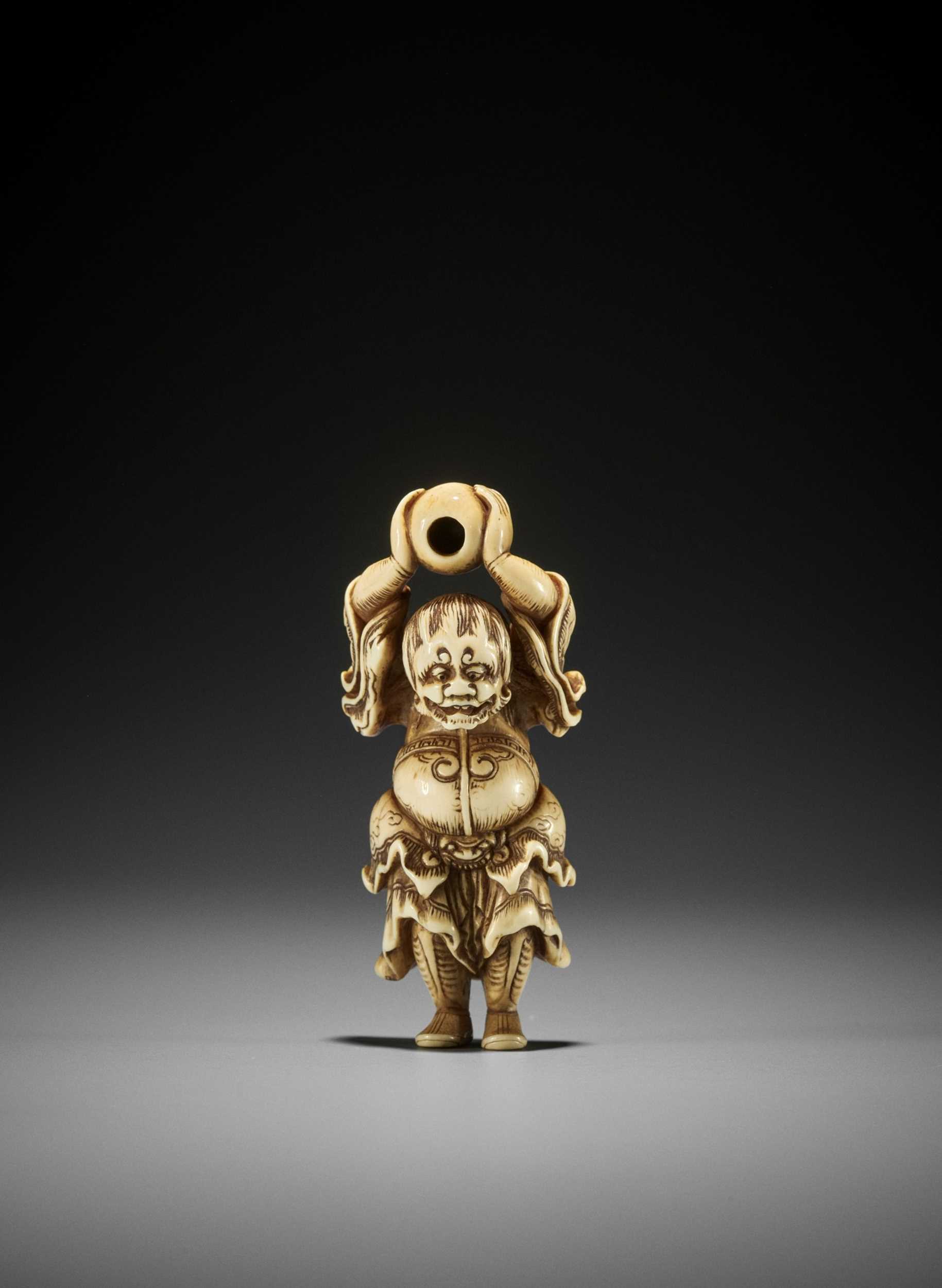 Ɏ A RARE AND SUPERB IVORY NETSUKE OF RYUJIN WITH TAMA, ATTRIBUTED TO SANKO