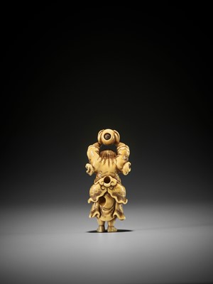 Lot 65 - A RARE AND SUPERB IVORY NETSUKE OF RYUJIN WITH TAMA, ATTRIBUTED TO SANKO