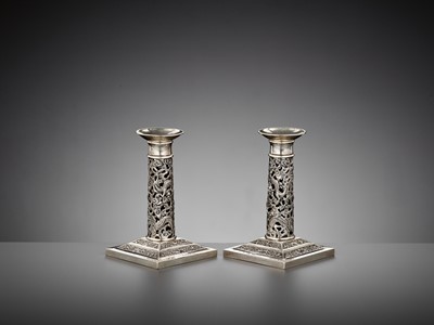 Lot 25 - A PAIR OF RETICULATED SILVER CANDLESTICKS, WANG HING, LATE QING DYNASTY