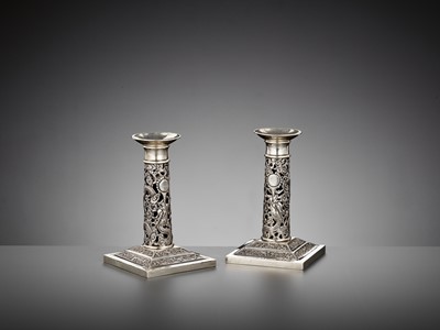 Lot 25 - A PAIR OF RETICULATED SILVER CANDLESTICKS, WANG HING, LATE QING DYNASTY