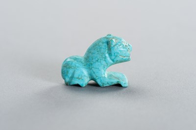 Lot 675 - AN ANCIENT STYLE TURQUOISE TIGER AMULET
