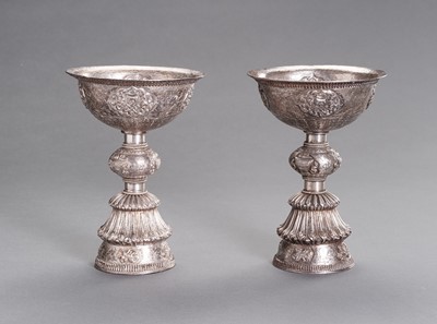 Lot 106 - A LARGE PAIR OF SILVER BUTTER LAMPS