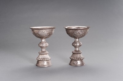 Lot 106 - A LARGE PAIR OF SILVER BUTTER LAMPS